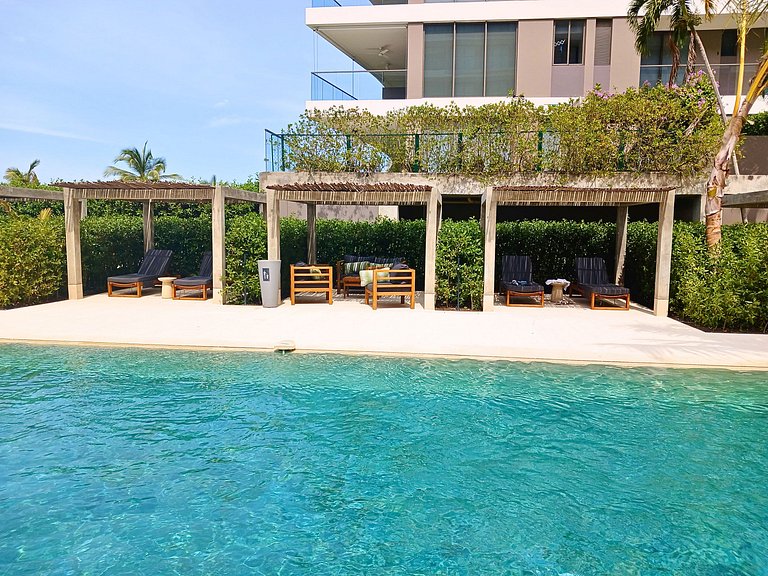 Lujoso Apto con Piscina Privada y salida a playa