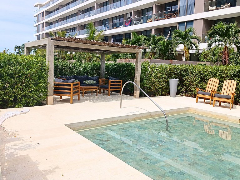 Lujoso Apto con Piscina Privada y salida a playa