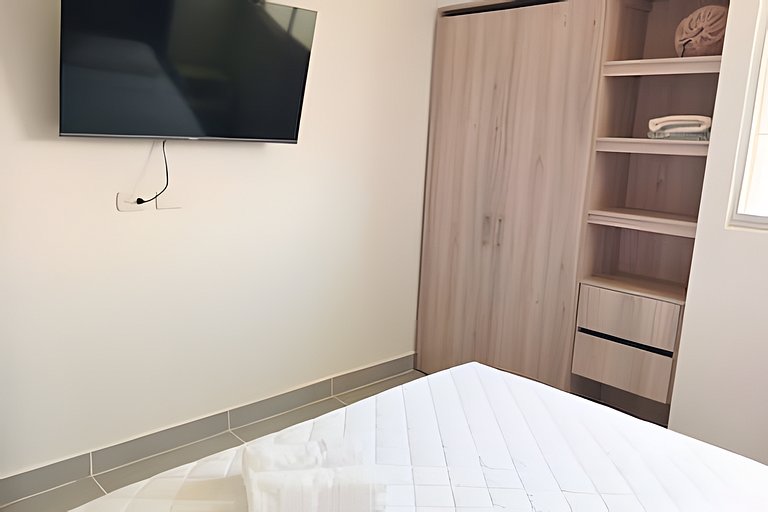 Escapada Perfecta: 2 Camas Queen y Playa a un Paso