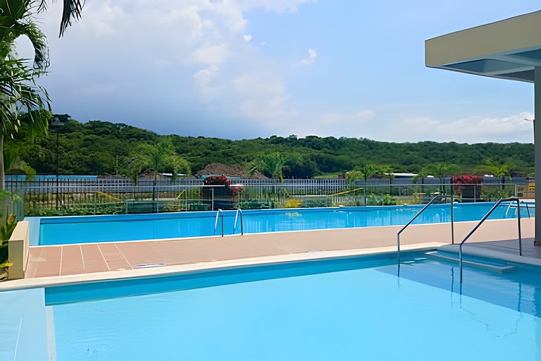 Escapada Perfecta: 2 Camas Queen y Playa a un Paso